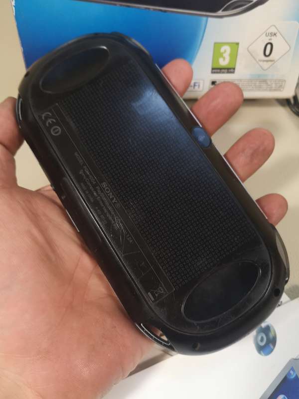 Complete PS Vita With Charge Cable, Booklets, Game and Original Box