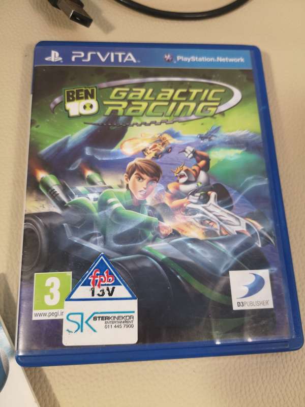 Complete PS Vita With Charge Cable, Booklets, Game and Original Box