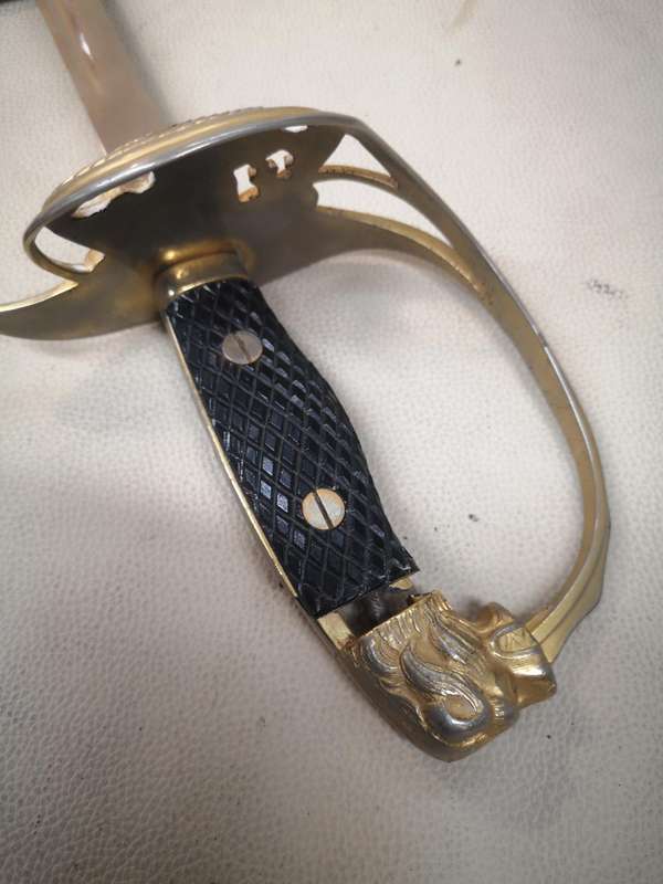 Spanish WWII era officers lionhead dress sword with scabbard by Toledo