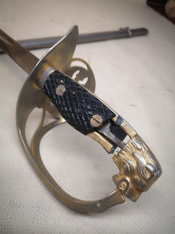 Spanish WWII era officers lionhead dress sword with scabbard by Toledo
