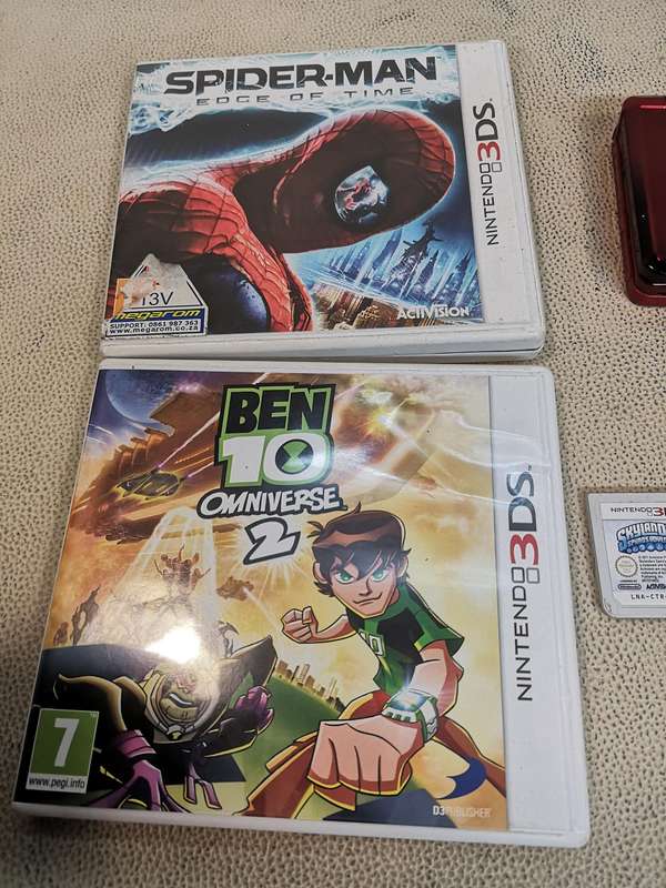 Nintendo 3DS Metallic Red Handheld Console with 5 Games & Charger
