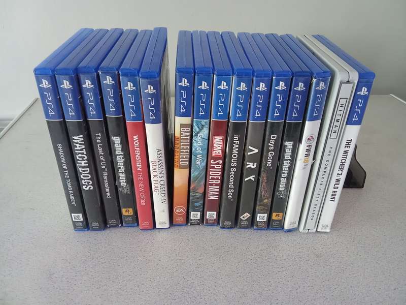 Faulty ps4 with 15 games and 2 controllers for sale.