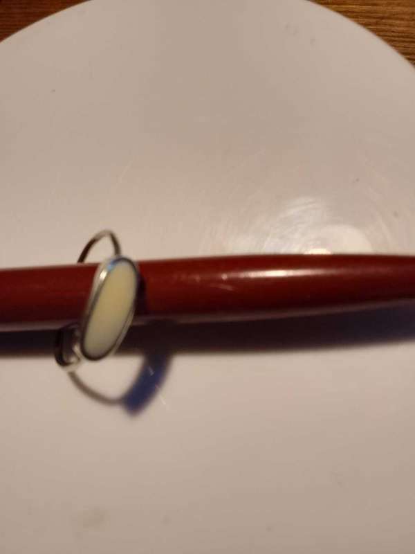 Sterling silver ring with white stone