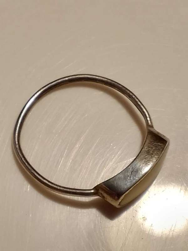 Sterling silver ring with white stone