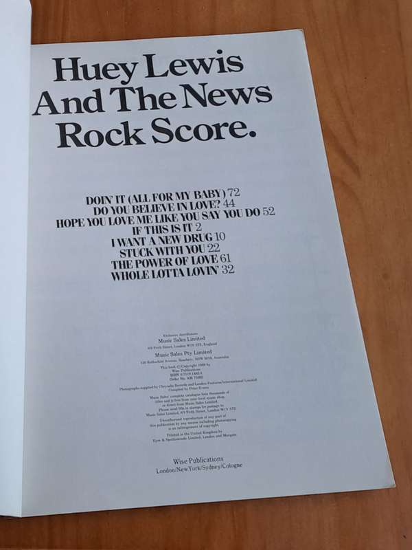 Huey Lewis and the News rock score: Eight famous songs scored for small groups. Complete with lyric