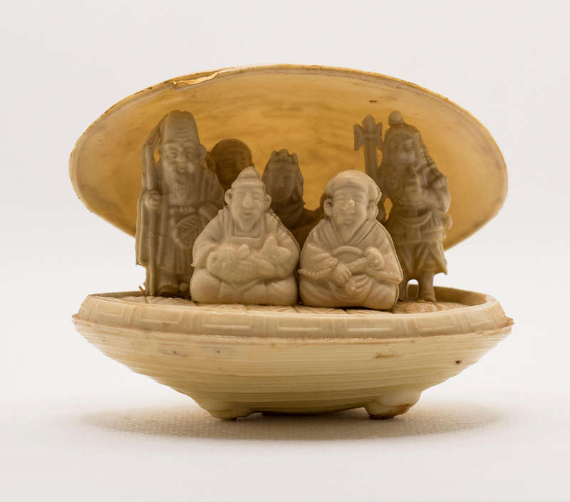 Vintage hand-carved Seven Lucky Gods in Clam Shell 8cmx 5cm
