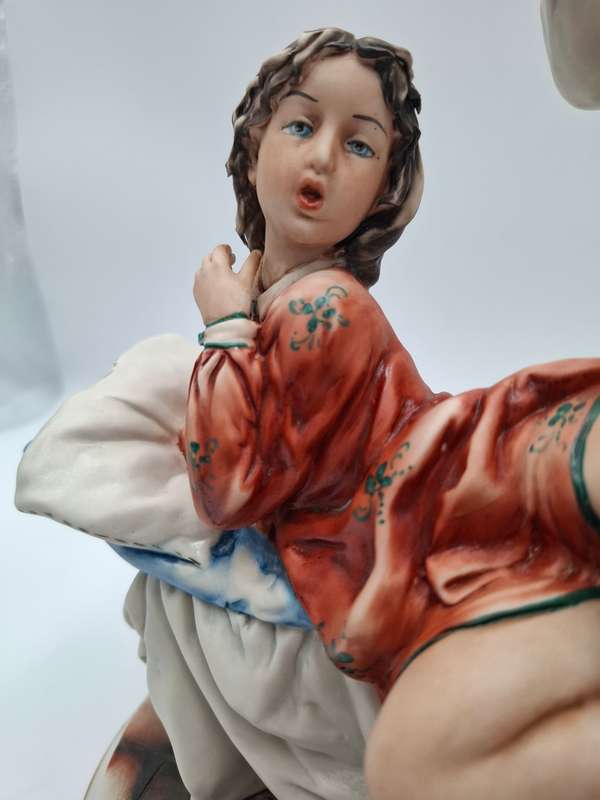 Captivating Italian Risque Capodimonte Sculpture - Doctor treating a Young Woman - Signed by Artist