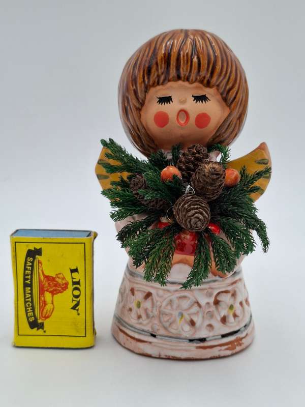 Vintage Singing Christmas Angel carrying a Christmas Posy