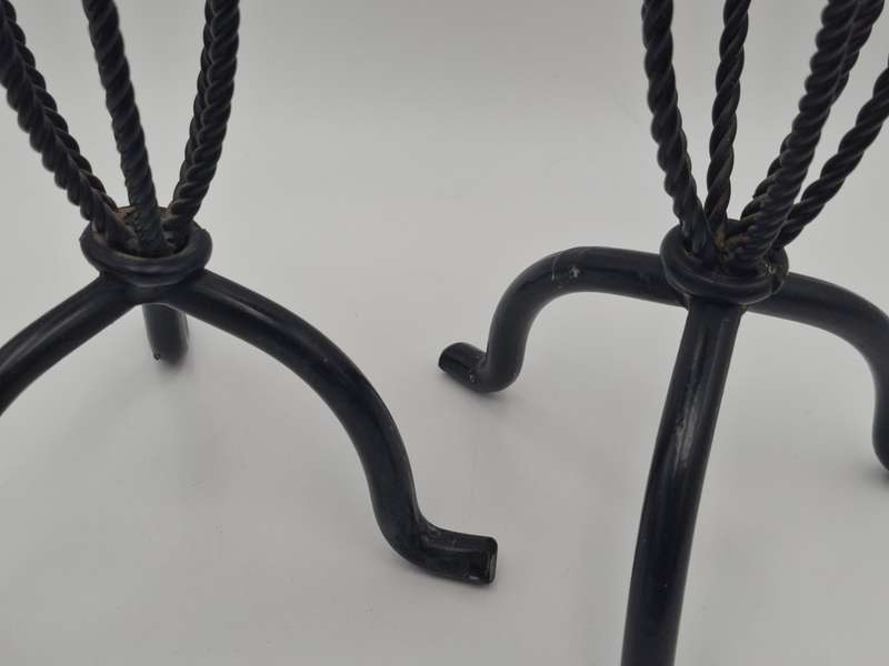 A Pair of Black Metal Candle Sticks for Pillar Candles - Rope Themed