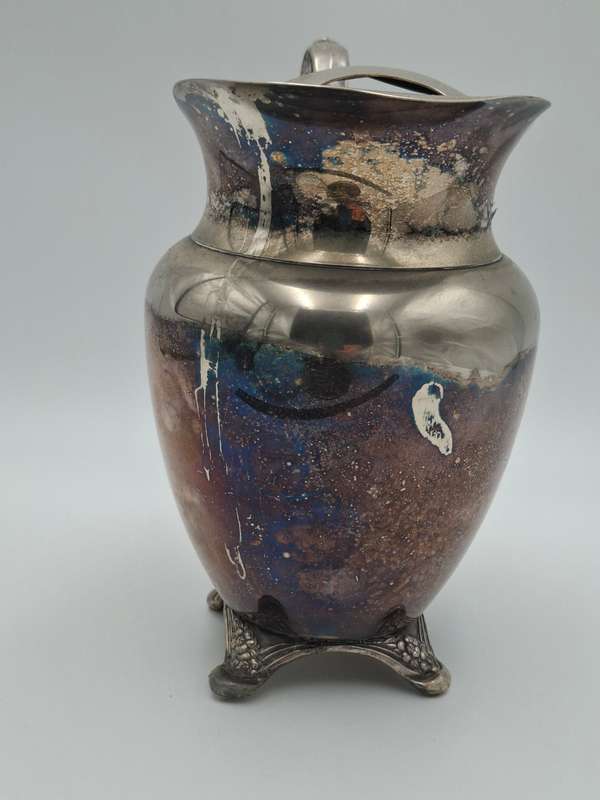 Vintage Silver Plated Pitcher with Embossed Ornate Design on the Handle and Base