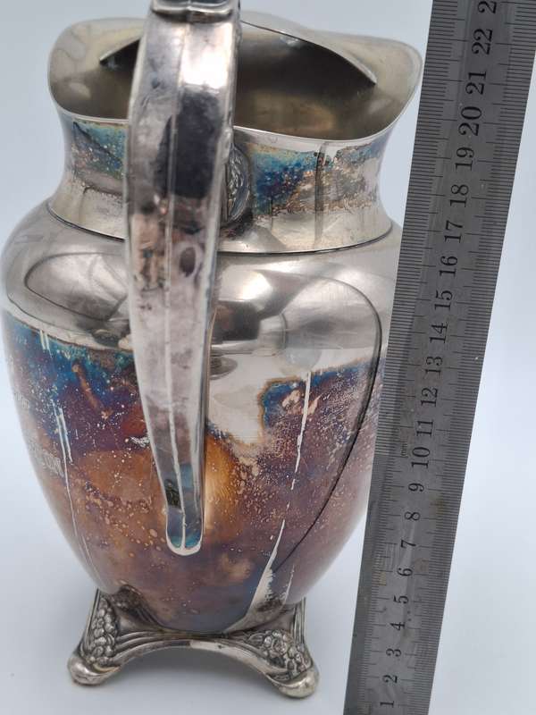 Vintage Silver Plated Pitcher with Embossed Ornate Design on the Handle and Base