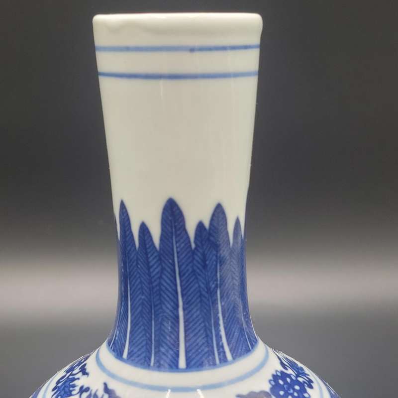Vintage Oriental Porcelain Vase with Blue & White Hand-painted Design - Elegant shape