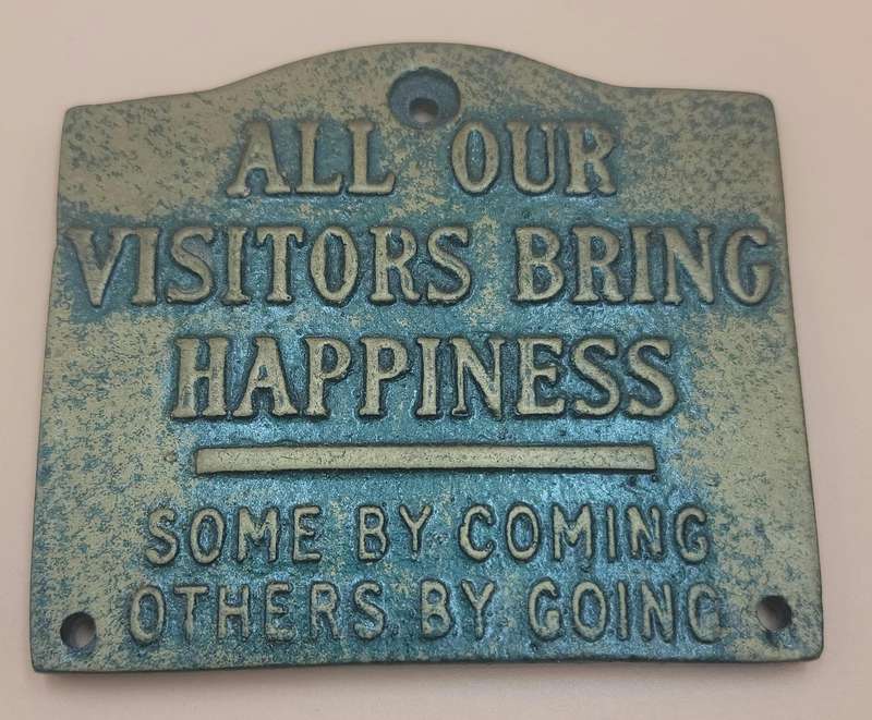 Ceramic Brass style Plaque "All our visitors bring happiness, some by coming, others by going"