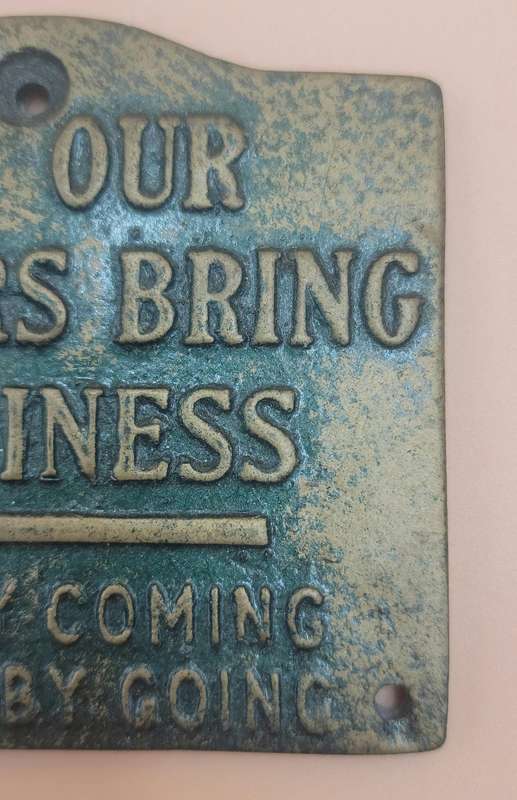 Ceramic Brass style Plaque "All our visitors bring happiness, some by coming, others by going"