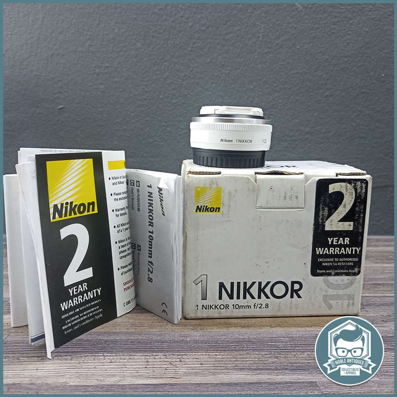 Boxed, Never Used NIKON 1 NIKKOR 10mm f/2.8 Lens (White)