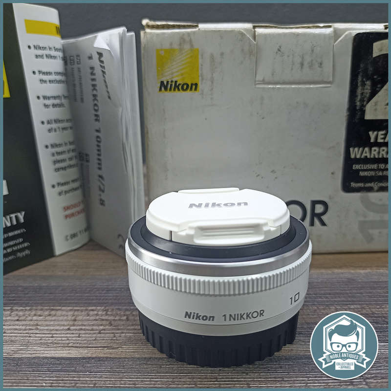 Boxed, Never Used NIKON 1 NIKKOR 10mm f/2.8 Lens (White)