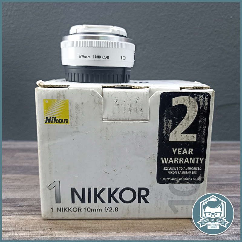 Boxed, Never Used NIKON 1 NIKKOR 10mm f/2.8 Lens (White)