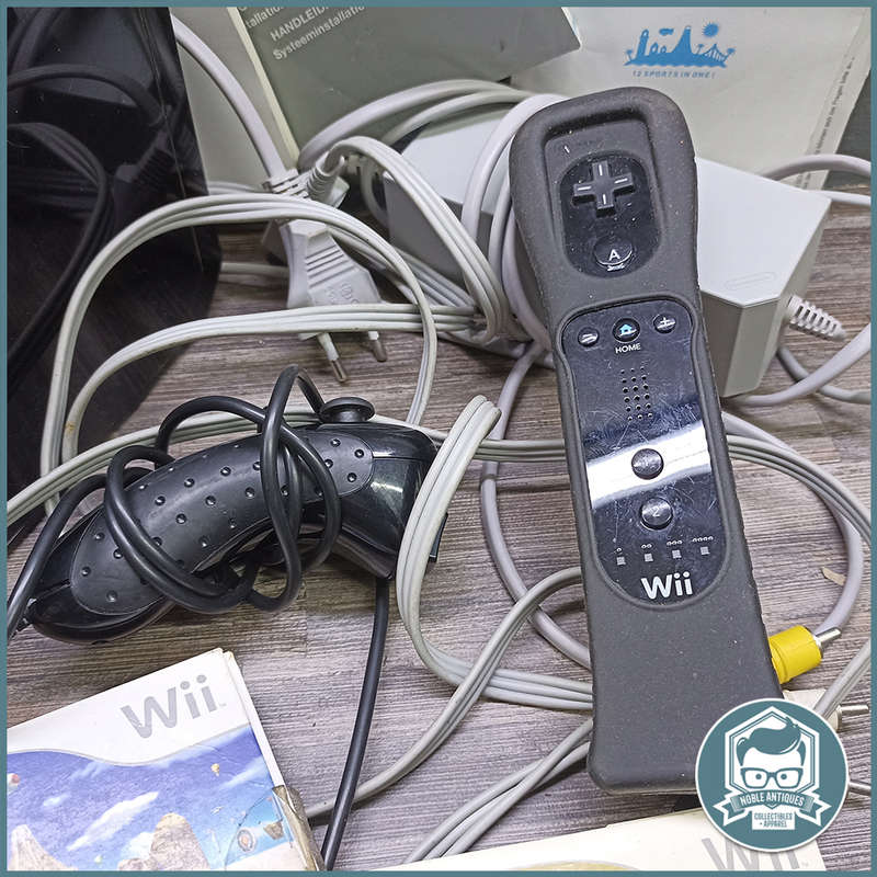 Original Black Wii Console, good condition, No Action Bar