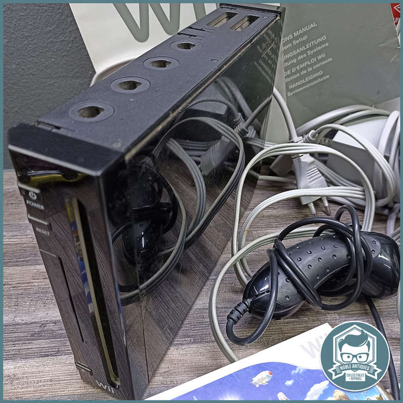 Original Black Wii Console, good condition, No Action Bar