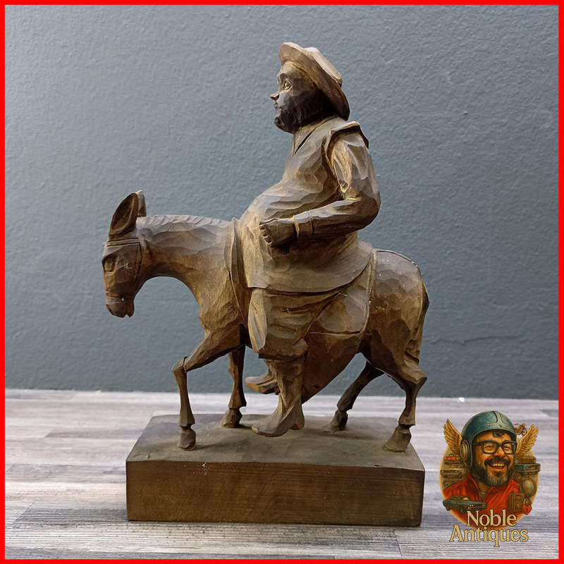 Vintage, hand-carved wood figures, Don Quixote on his horse and Sancho Panza on his donkey