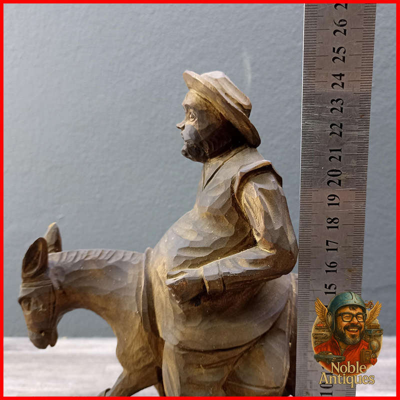 Vintage, hand-carved wood figures, Don Quixote on his horse and Sancho Panza on his donkey