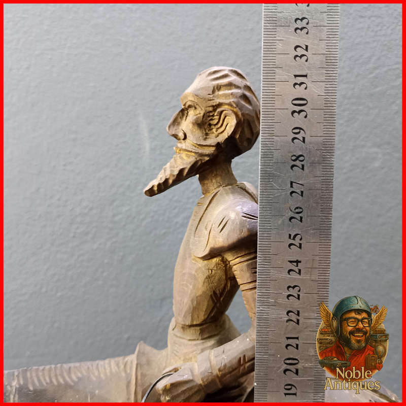 Vintage, hand-carved wood figures, Don Quixote on his horse and Sancho Panza on his donkey