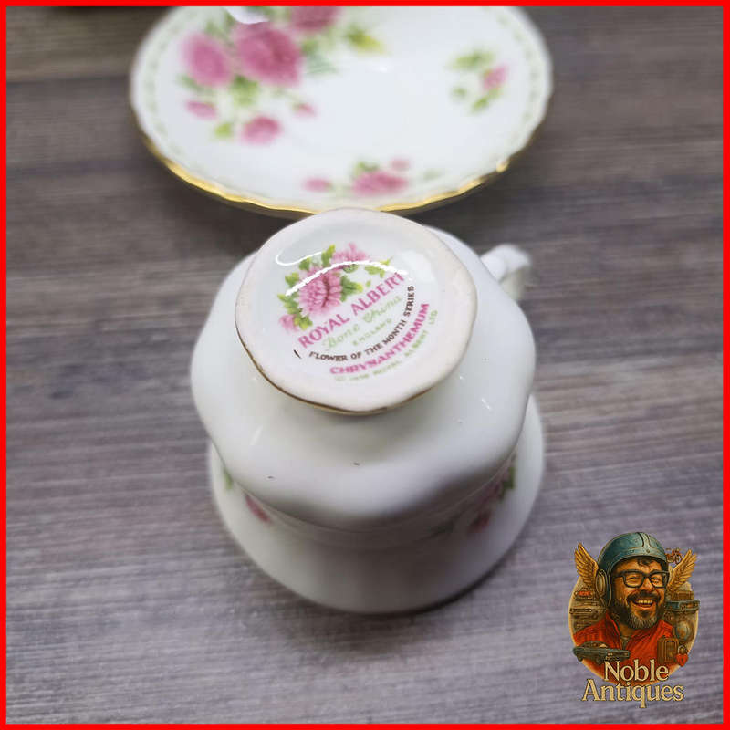 Boxed Royal Albert "Flowers of the Month" Mini teacup and saucer, November