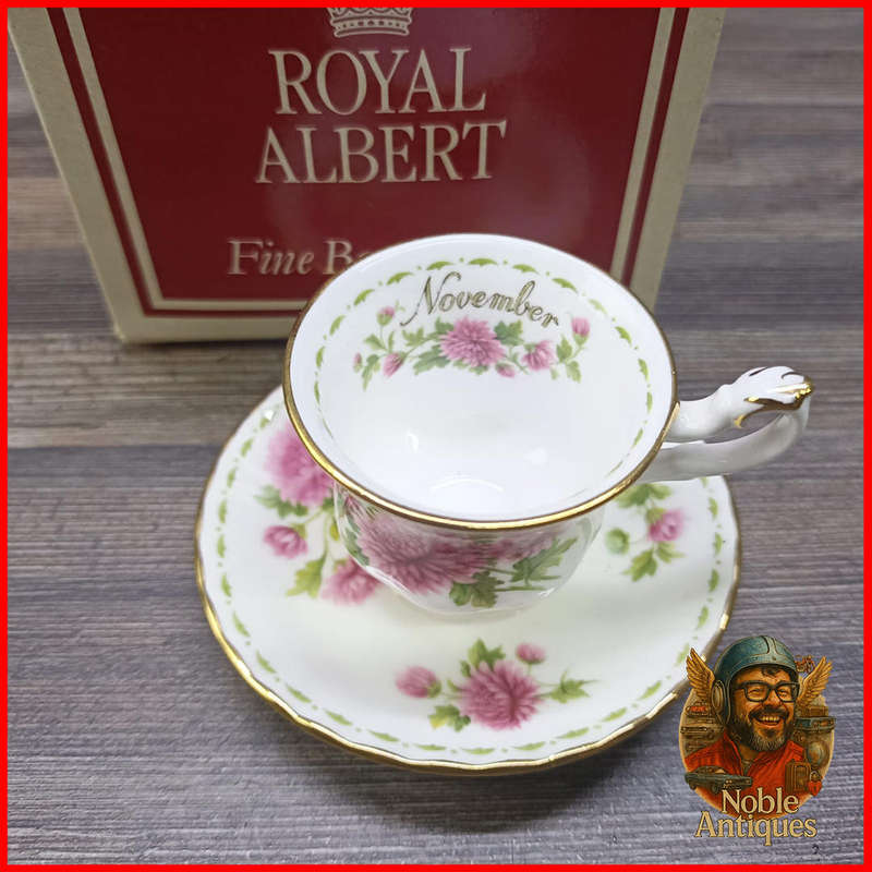 Boxed Royal Albert "Flowers of the Month" Mini teacup and saucer, November