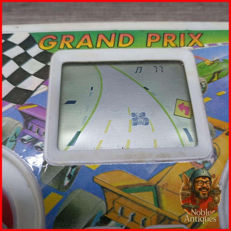 Working vintage Grand Prix handheld electronic racing game
