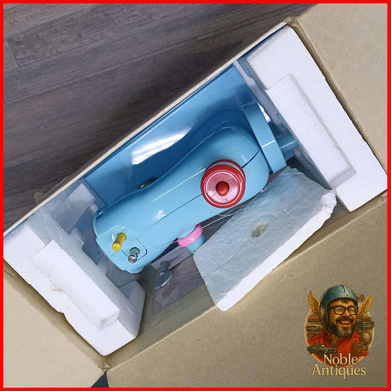 Vintage Boxed Little Miss Homemaker manual-operated toy sewing machine