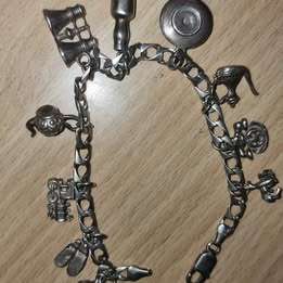Sterling Silver 6mm bracelet with silver charms - Weight -41g charm