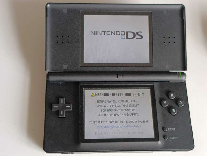 Nintendo Ds Lite +4 Games