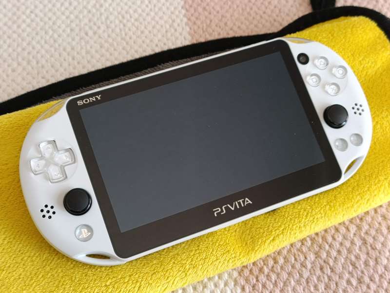 PS Vita Slim with Box +16gb Memory card Glacier White