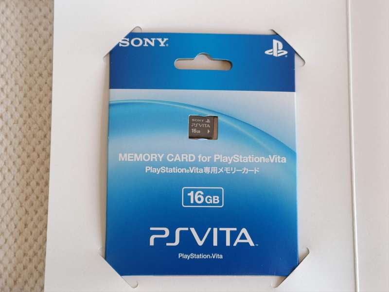 PS Vita Slim with Box +16gb Memory card Glacier White
