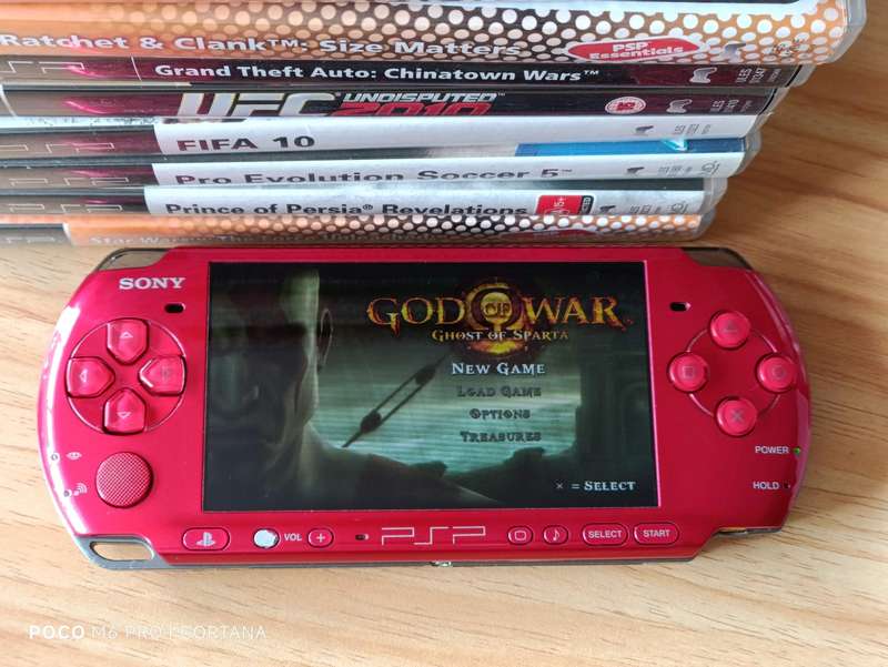 PSP Console With Games, Original Charger and Memory Card