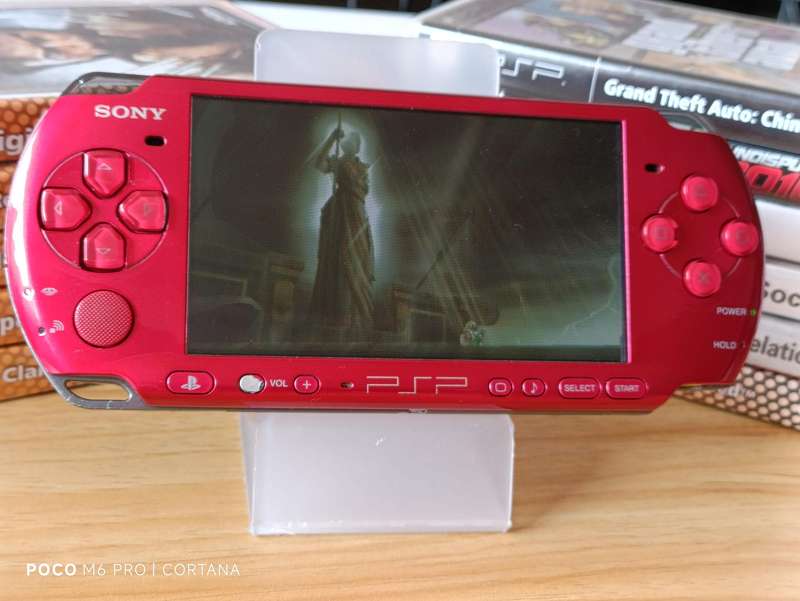 PSP Console With Games, Original Charger and Memory Card