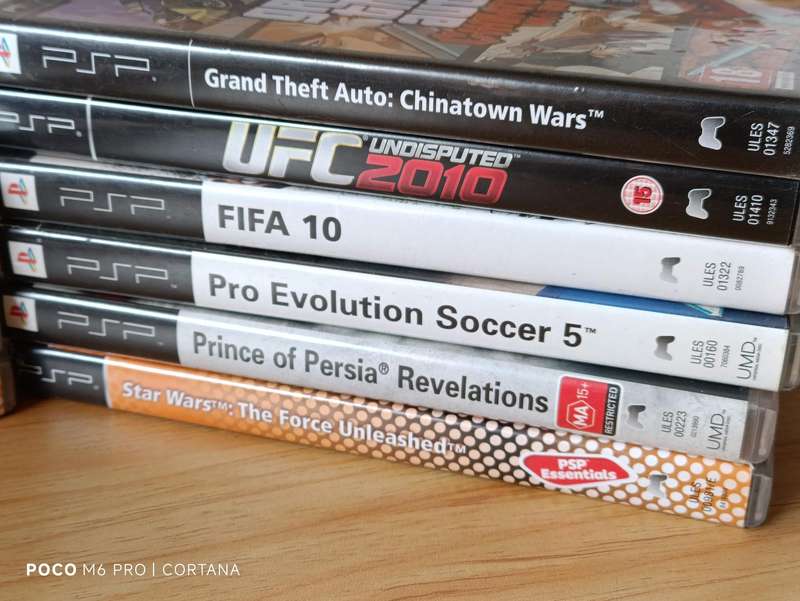 PSP Console With Games, Original Charger and Memory Card