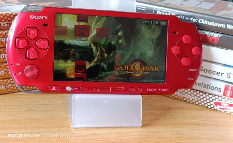 PSP Console With Games, Original Charger and Memory Card