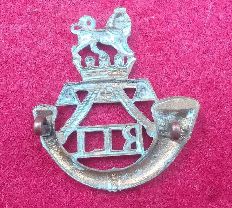 RAND LIGHT INFANTRY CAP BADGE - WORN 1913-1950