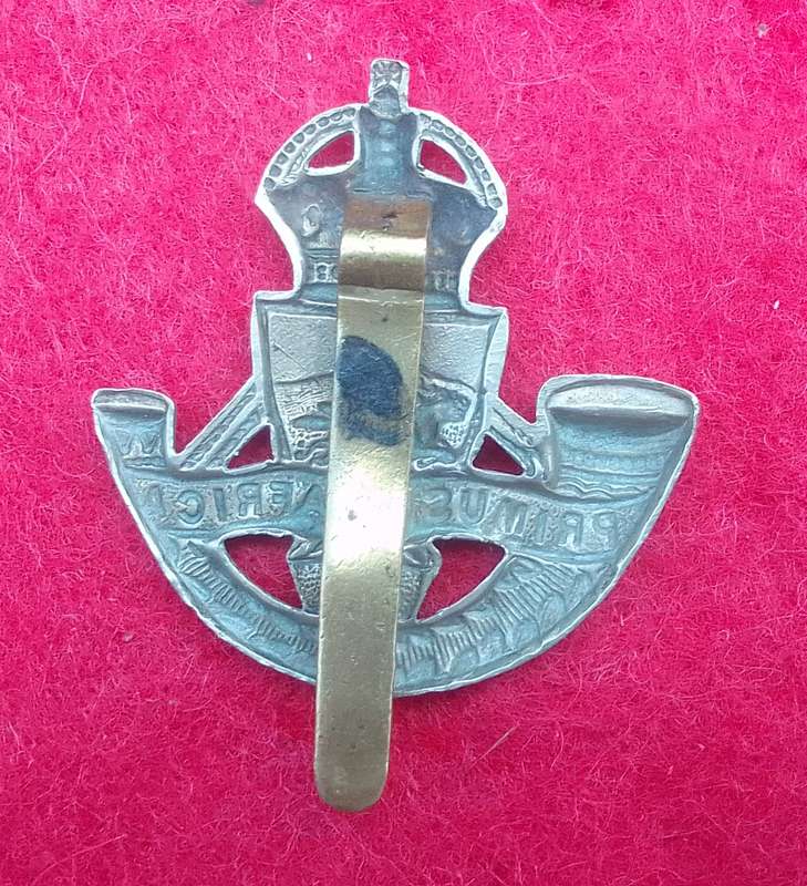 NATAL MOUNTED RIFLES CAP BADGE-WORN 1940`S-1950- 2 LUGS