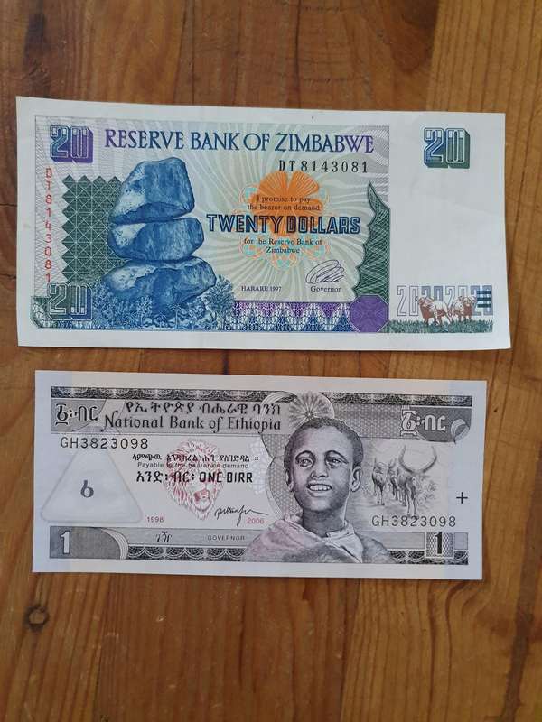 1 x Zimbabwe 20-dollar note (1997) + 1 x Ethiopia 1-birr note (2006)