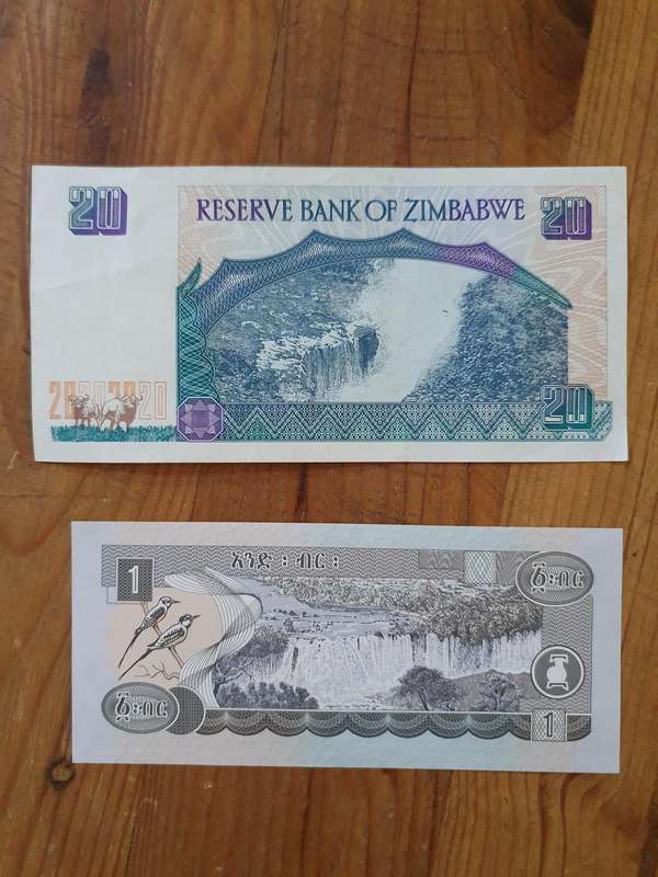 1 x Zimbabwe 20-dollar note (1997) + 1 x Ethiopia 1-birr note (2006)