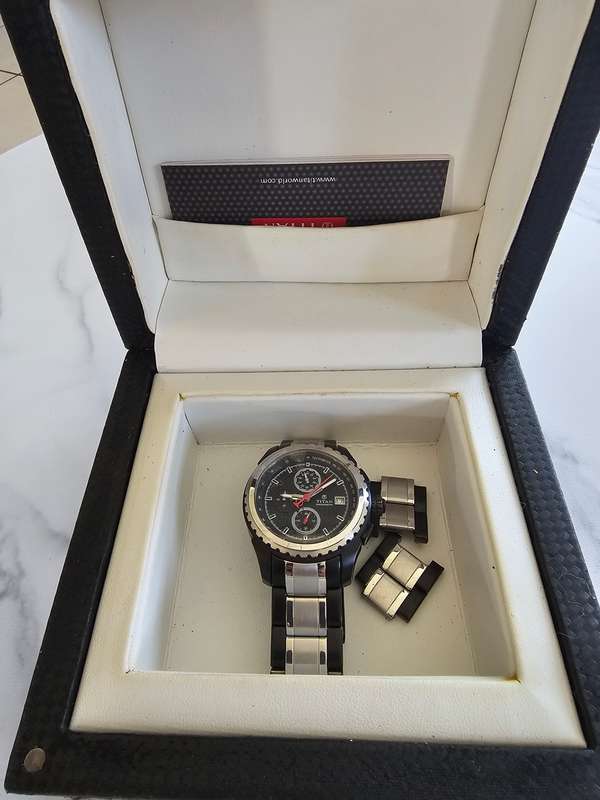 Titan Men's watch model: 10435LOIR