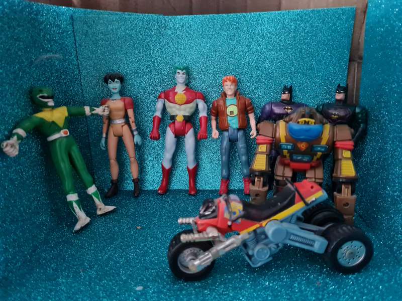 Lot of vintage figures and a bike.