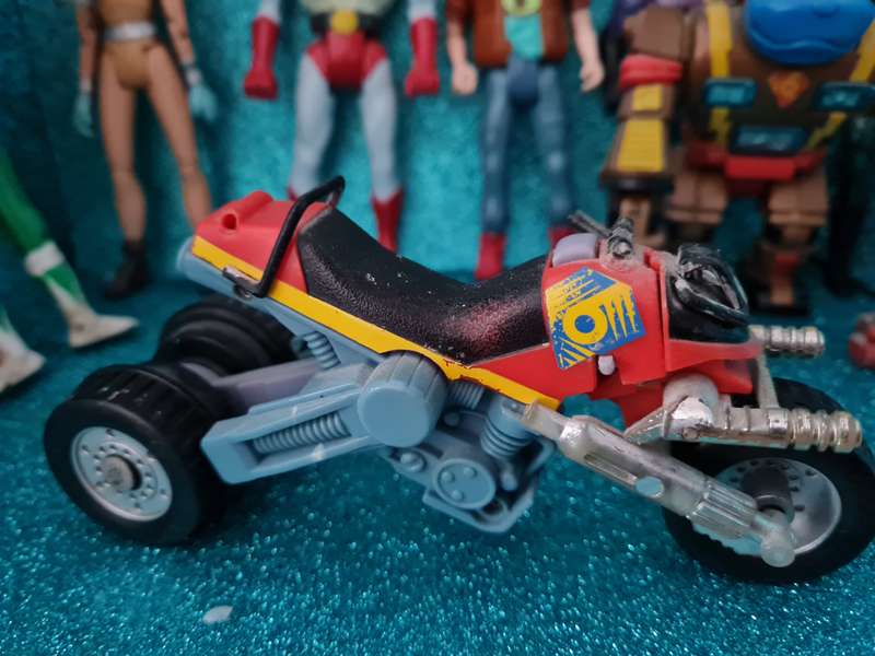 Lot of vintage figures and a bike.