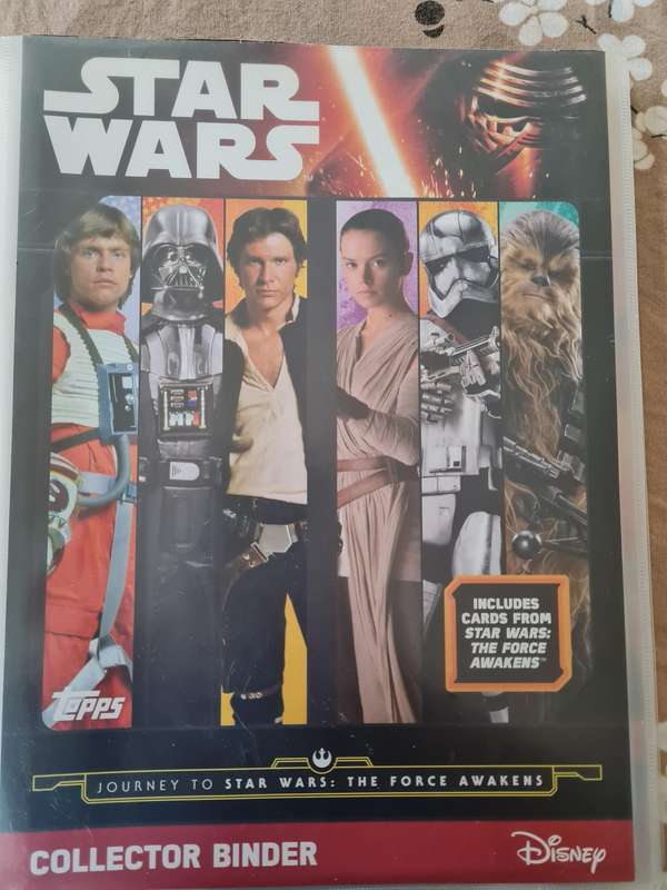 Star wars trading cards in collectors binder