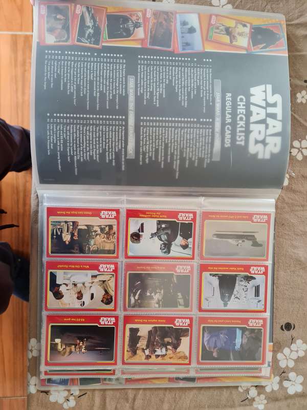 Star wars trading cards in collectors binder
