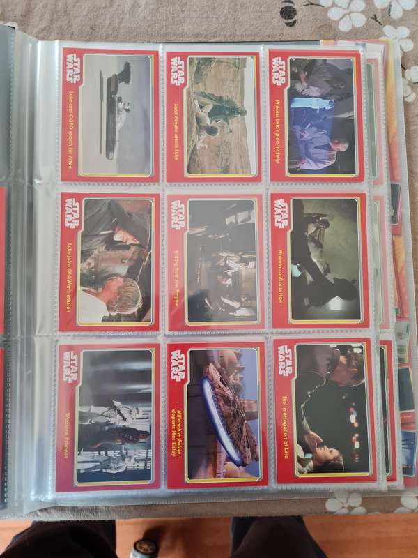 Star wars trading cards in collectors binder
