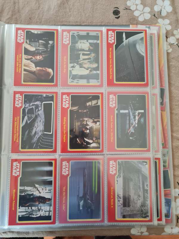 Star wars trading cards in collectors binder