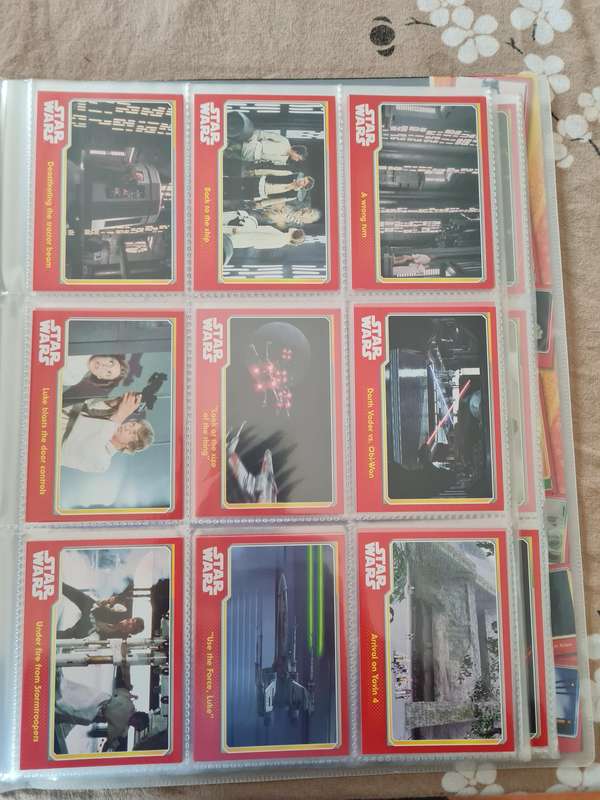 Star wars trading cards in collectors binder